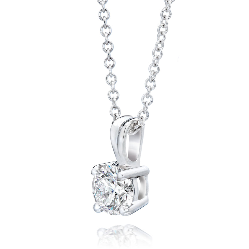 Diamond Solitaire Pendant In 14k White Gold 17" Chain. (0.70 Ct)