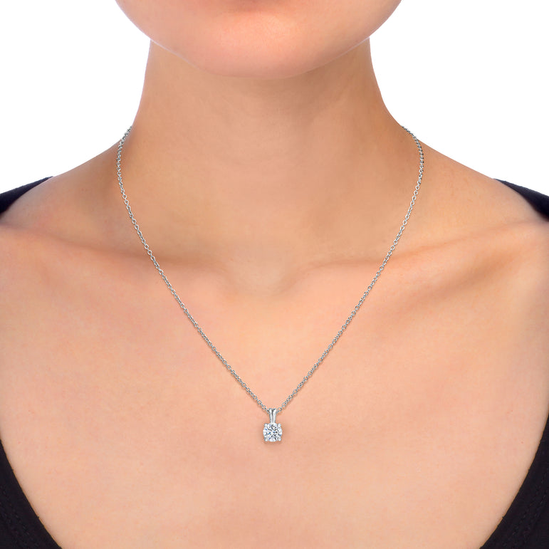 Diamond Solitaire Pendant In 14k White Gold 17" Chain. (0.70 Ct)